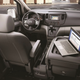 Imagen para el artículo titulado Ford ofrecía esta mesa de trabajo para el conductor en 1990, y es simplemente increíble